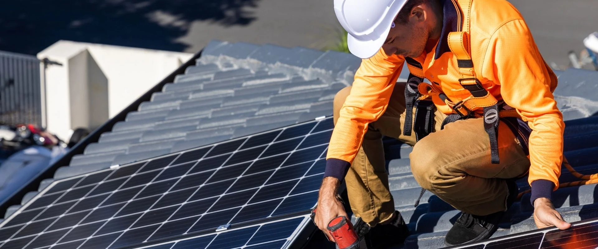 Aerial view of a New York home with rooftop solar panels