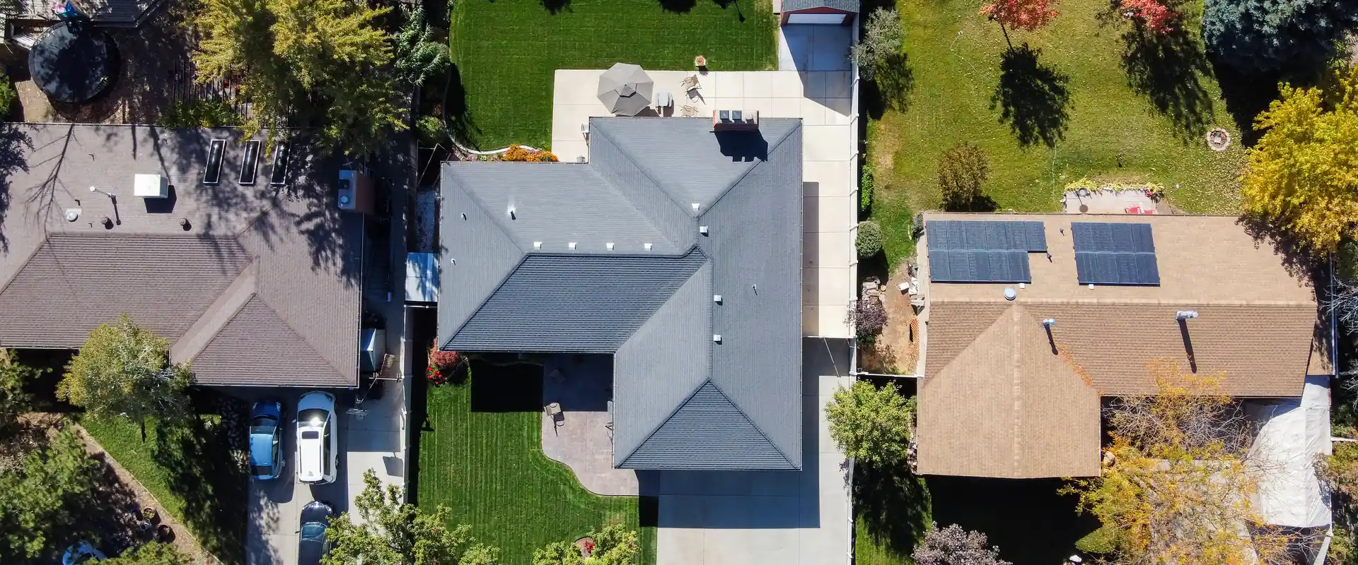 Solar panels on a residential roof in golden evening light