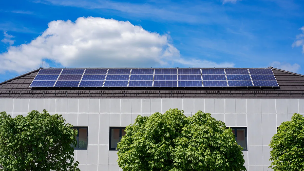 A community building with a rooftop solar array